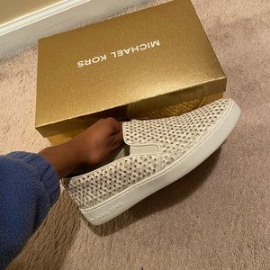 Michael Kors slip on sneakers.